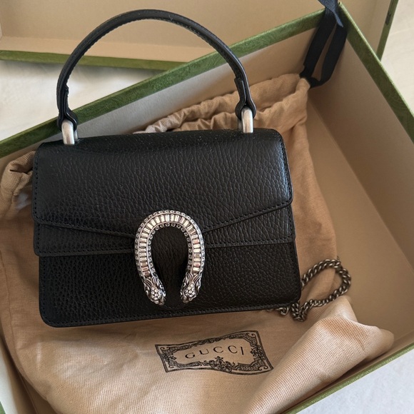 Gucci Handbags - Gucci Black Mini Bag with Silver Accent